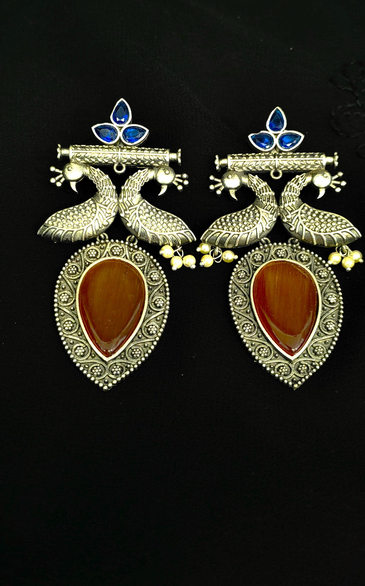 Peacock Vogue: Fashion-forward Brass Earrings