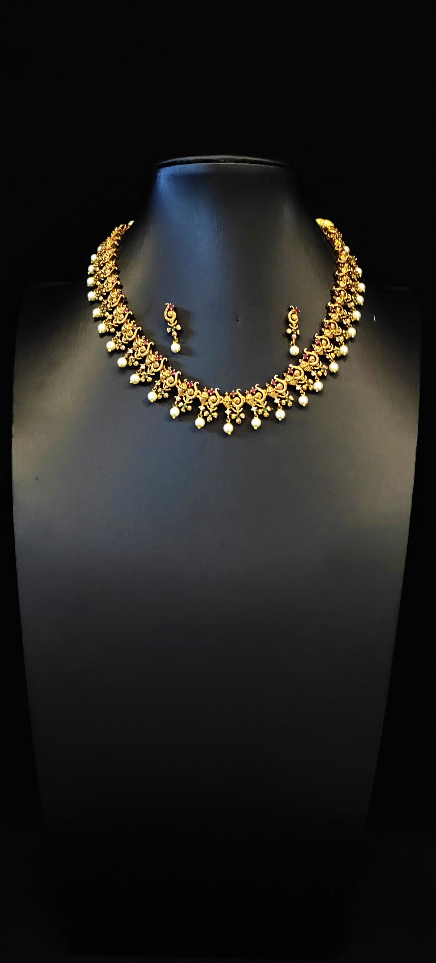 Temple Jewelery: Choker Set with Small Studs and Pearl Dangles in Rustic Gold Finish