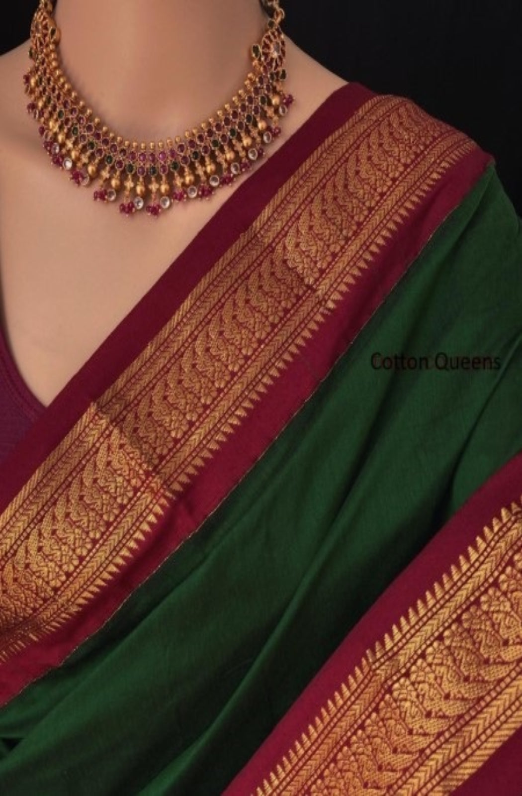 Peacock Splendor: Bottle Green Silk Cotton Saree with Contrast Red Golden Peacock Border