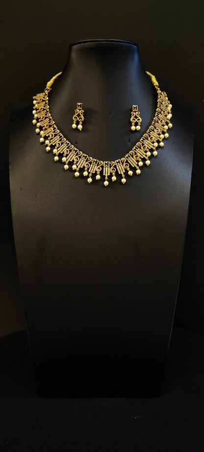 Divine Adornments: Golden Temple Necklace with Earrings for Women