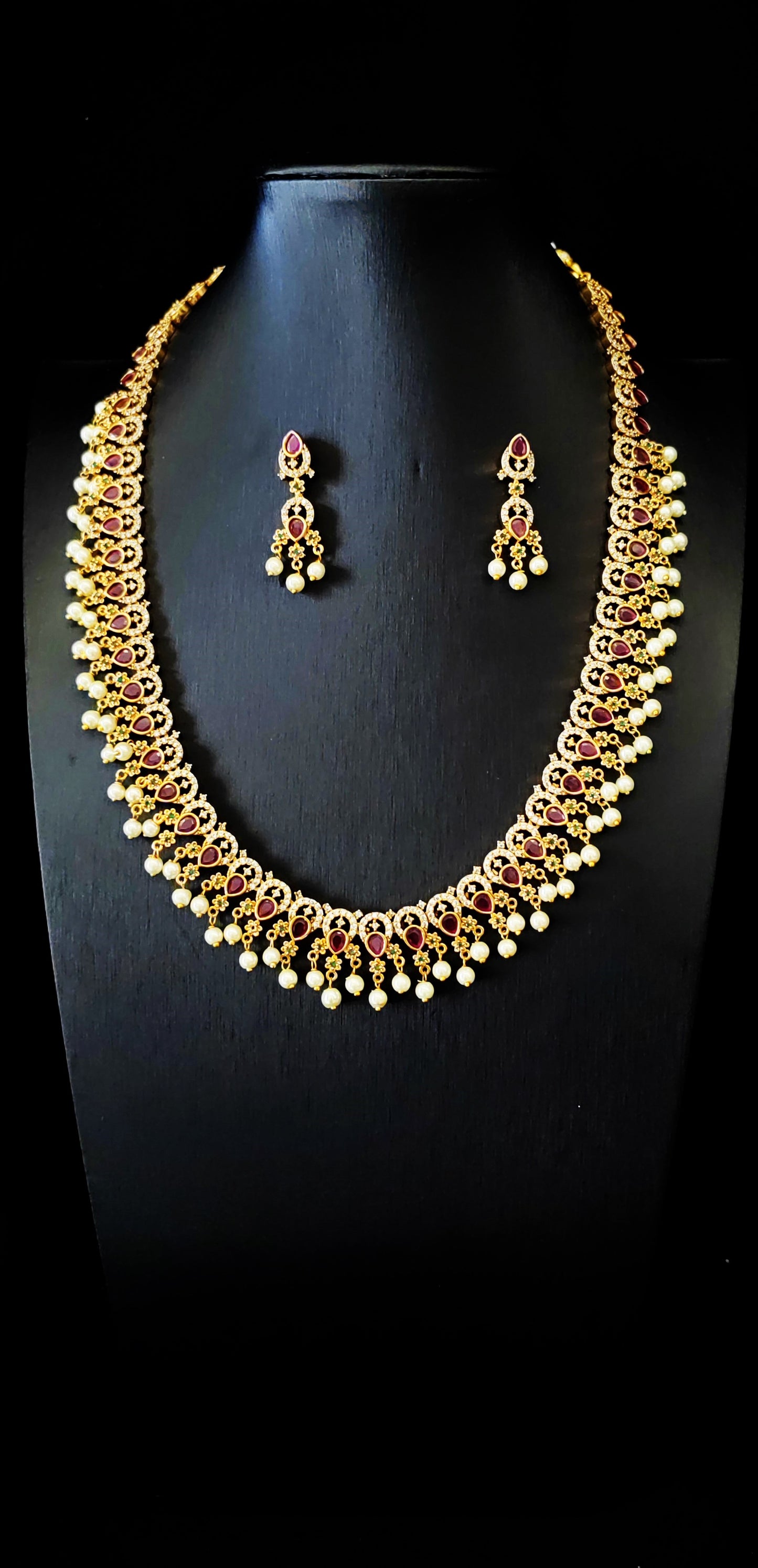 Temple Jewelery: Beautiful antique stone Matte Gold Finish Necklace with earrings