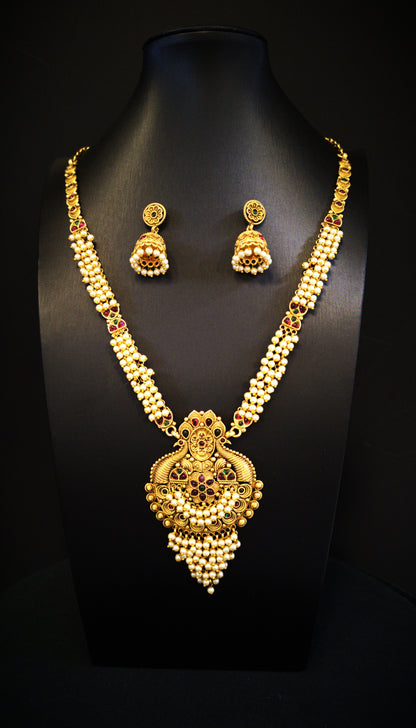 Temple Jewelry: Long Beads Haram Necklace Set with Jhumki in Golden Finish