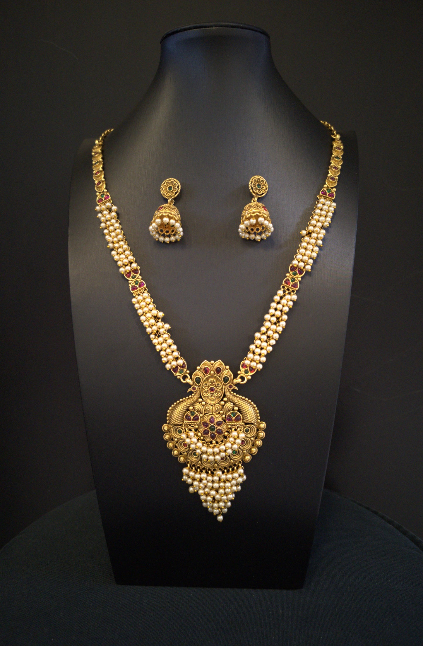 Temple Jewelry: Long Beads Haram Necklace Set with Jhumki in Golden Finish