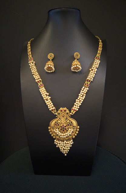 Temple Jewelry: Long Beads Haram Necklace Set with Jhumki in Golden Finish