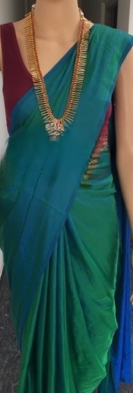 Nasha (Peacock Green Malai Silk Plain Saree)